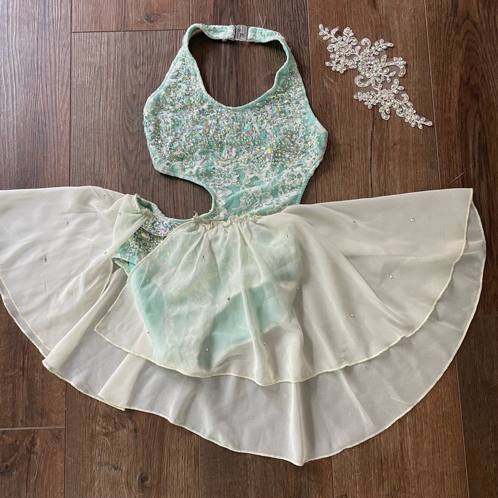 Lyrical dance costume already jeweled purchased used sold as is.